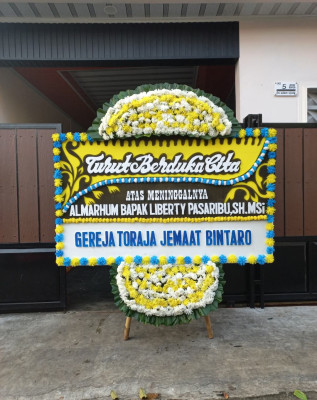 Papan Bunga Duka di Balai Riam